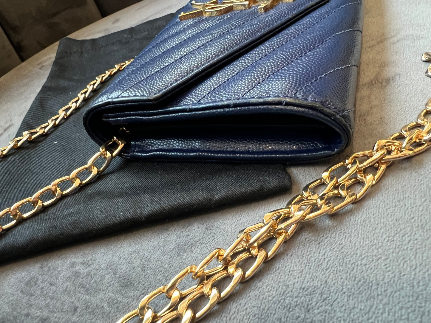 YSL monogram envelope flap wallet on chain