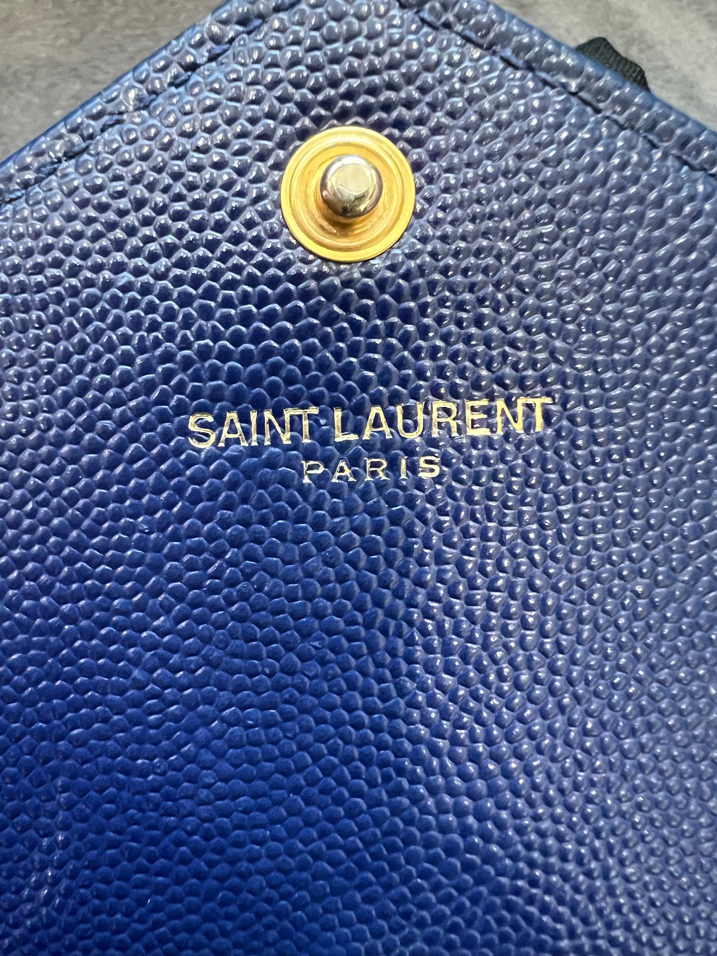 YSL monogram envelope flap wallet on chain