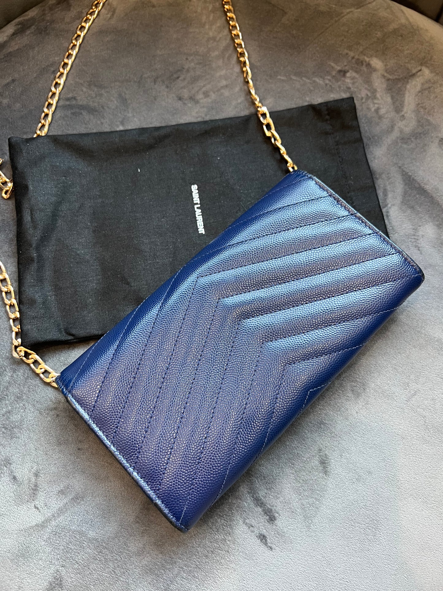 YSL monogram envelope flap wallet on chain