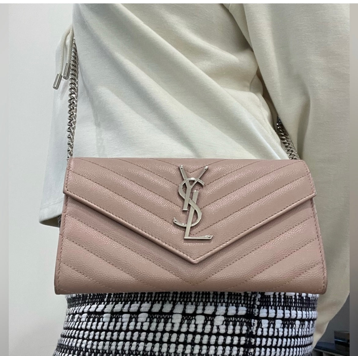 Pink YSL cassandre wallet on chain