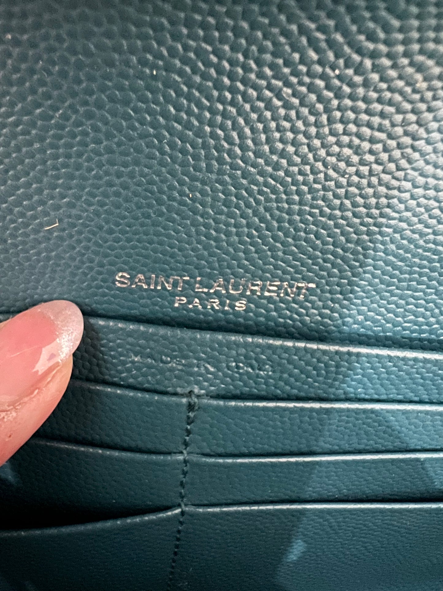 Turquoise YSL cassandre wallet on chain