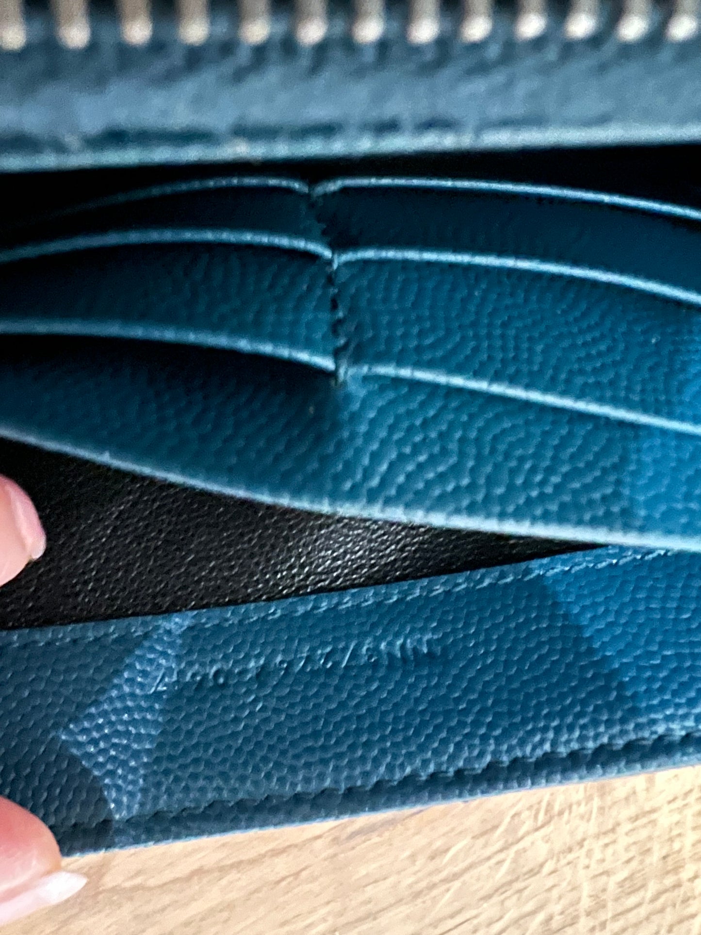 Turquoise YSL cassandre wallet on chain