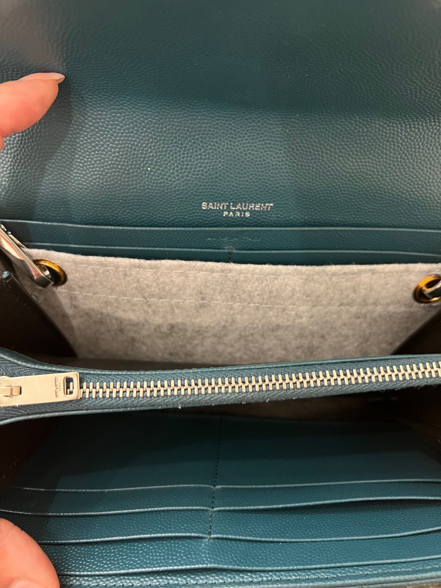 Turquoise YSL cassandre wallet on chain
