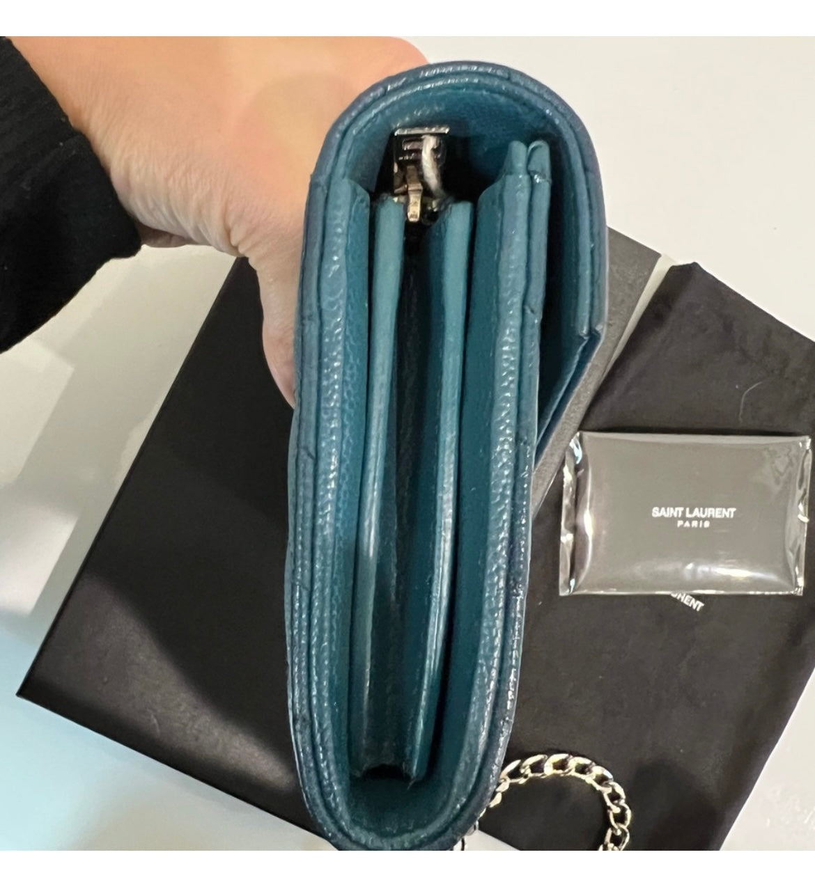 Turquoise YSL cassandre wallet on chain