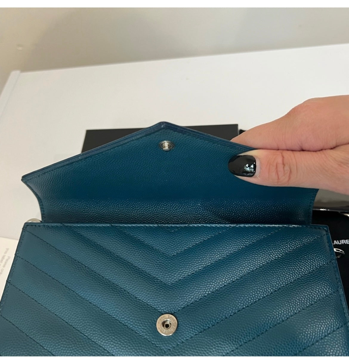 Turquoise YSL cassandre wallet on chain