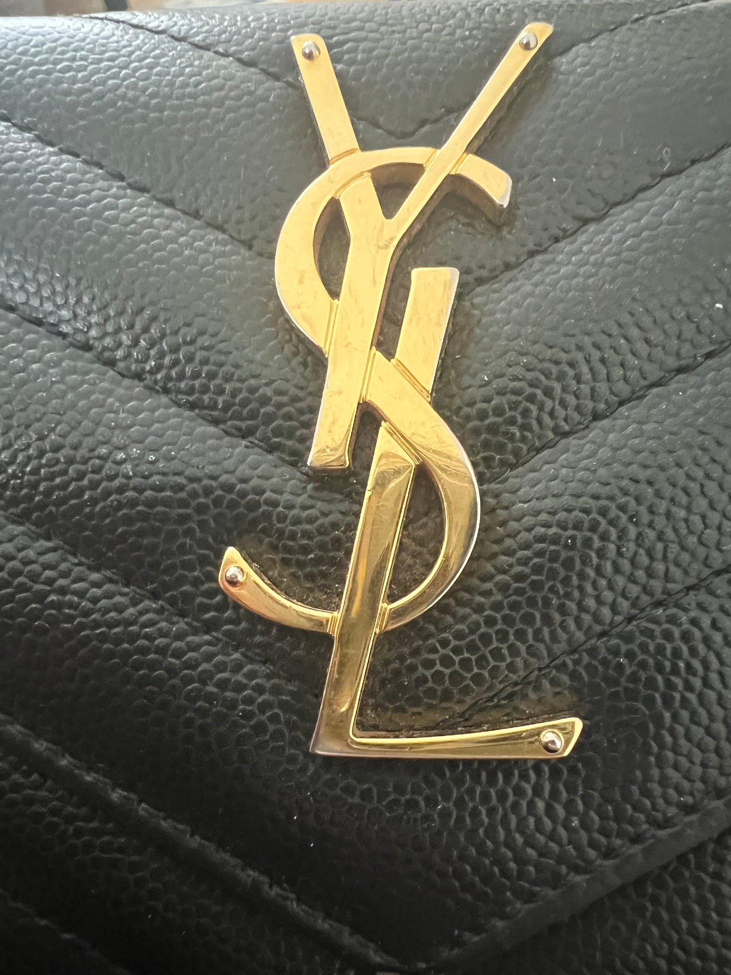 Black YSL cassandre envelope wallet on chain