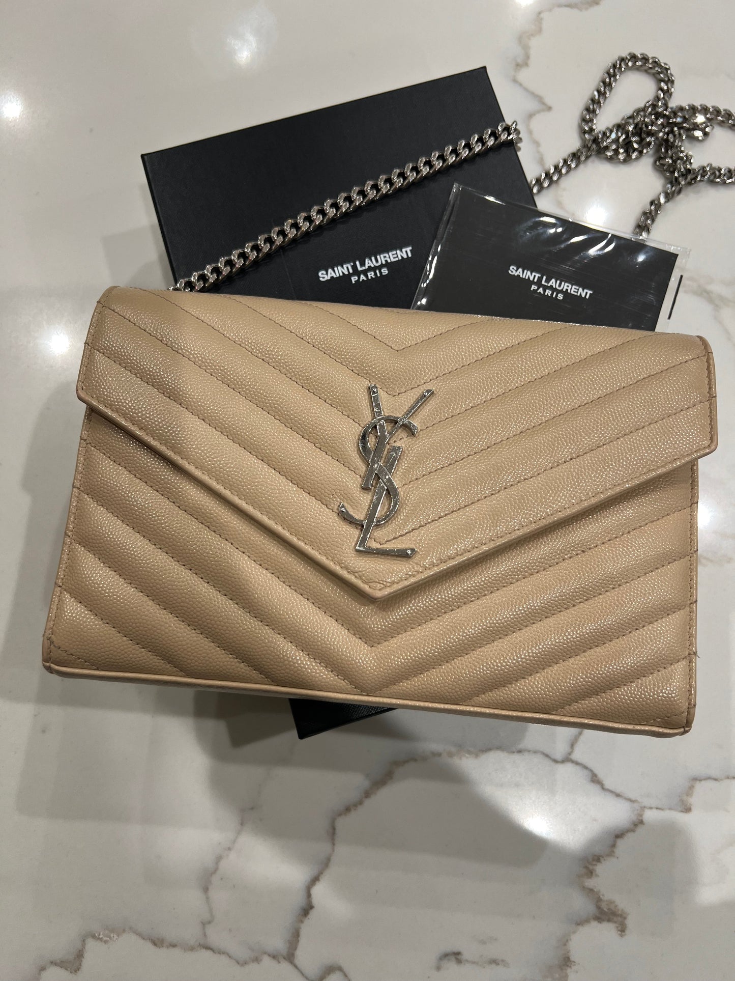 YSL Cassandre envelope flap beige crossbody bag