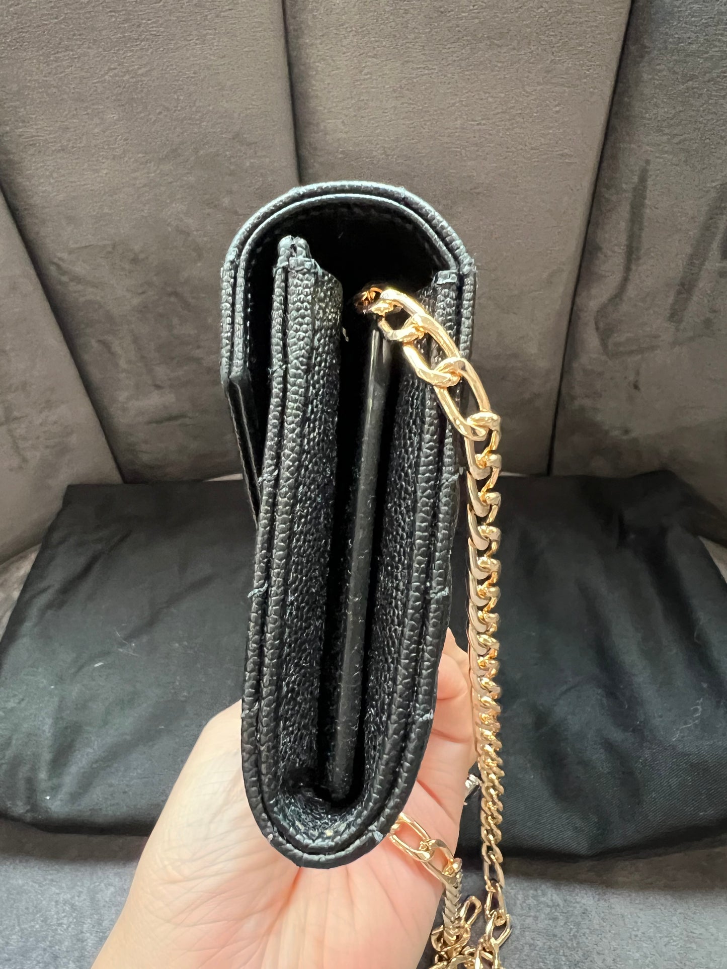 Black YSL cassandre envelope wallet on chain