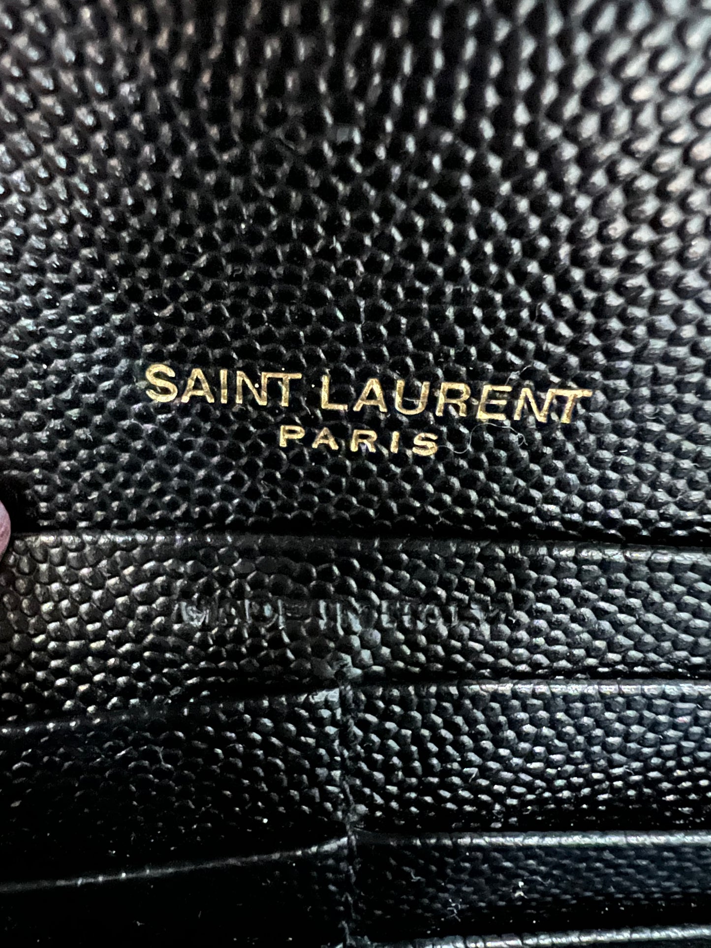 Black YSL cassandre envelope wallet on chain