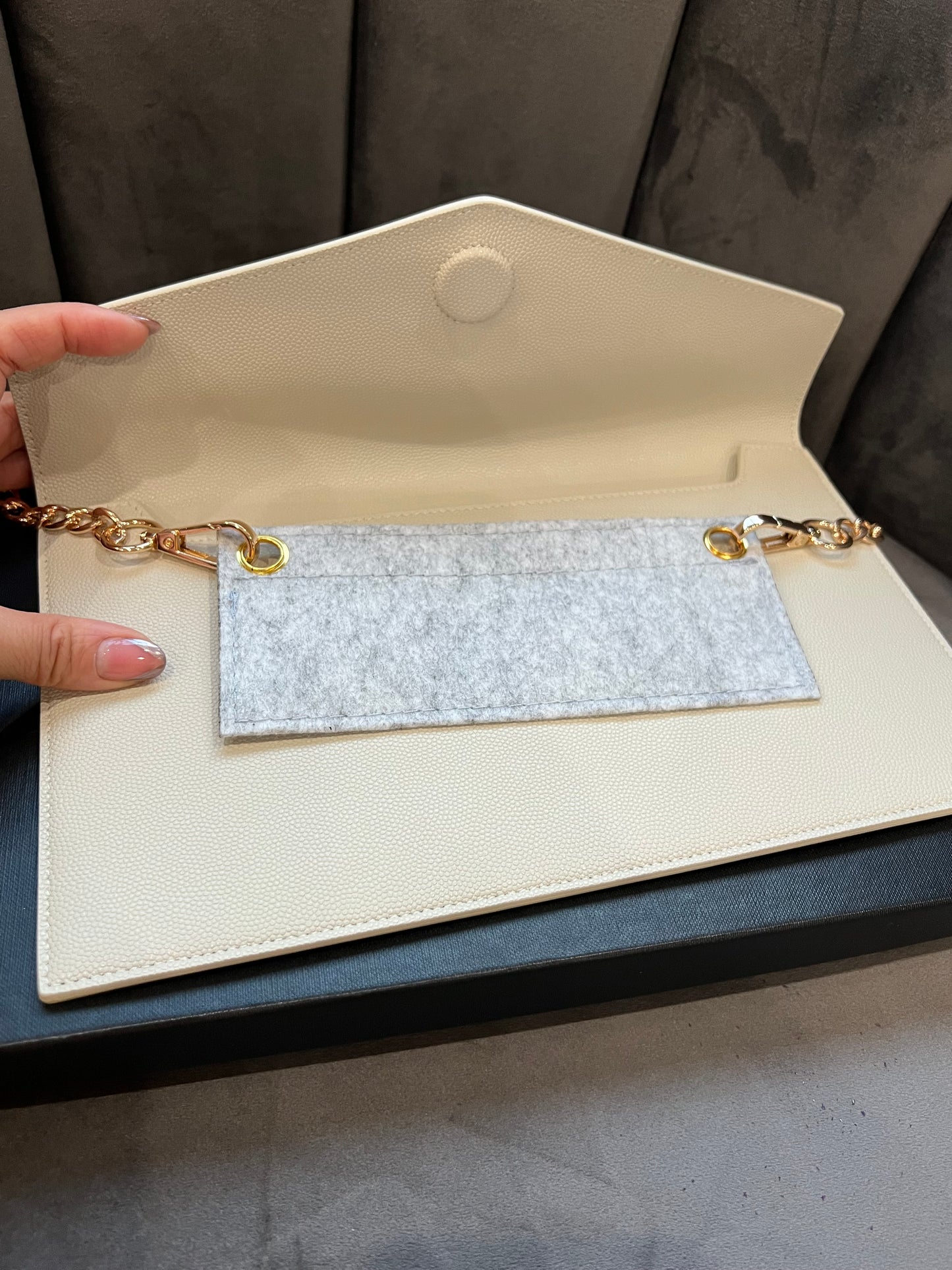 Saint Laurent uptown clutch with chain