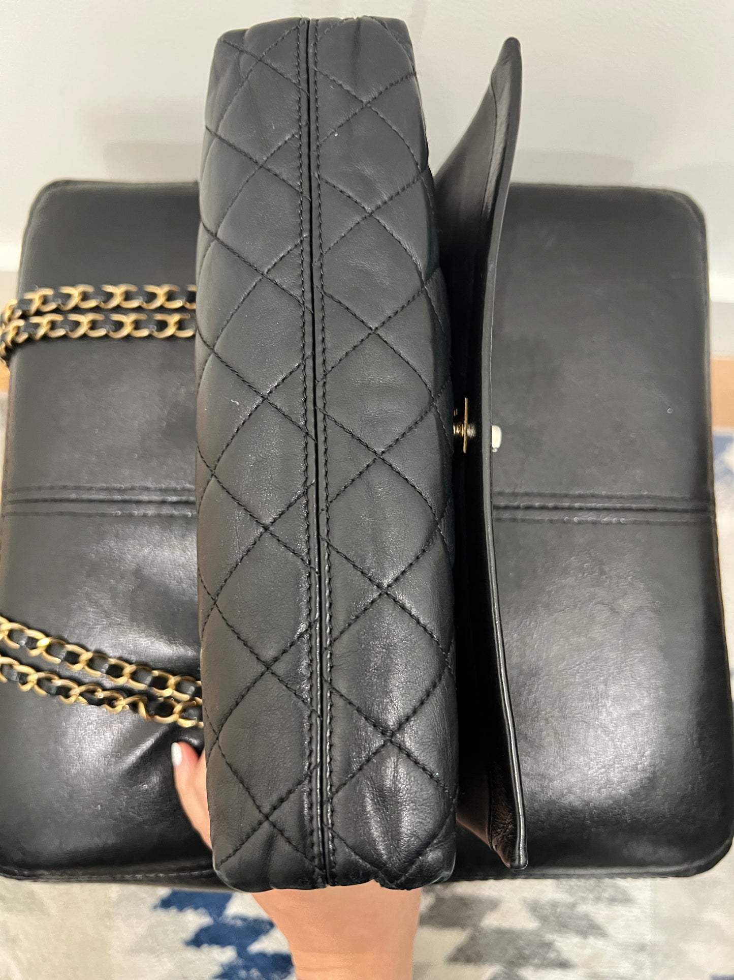 Chanel black single flap quilted handbag