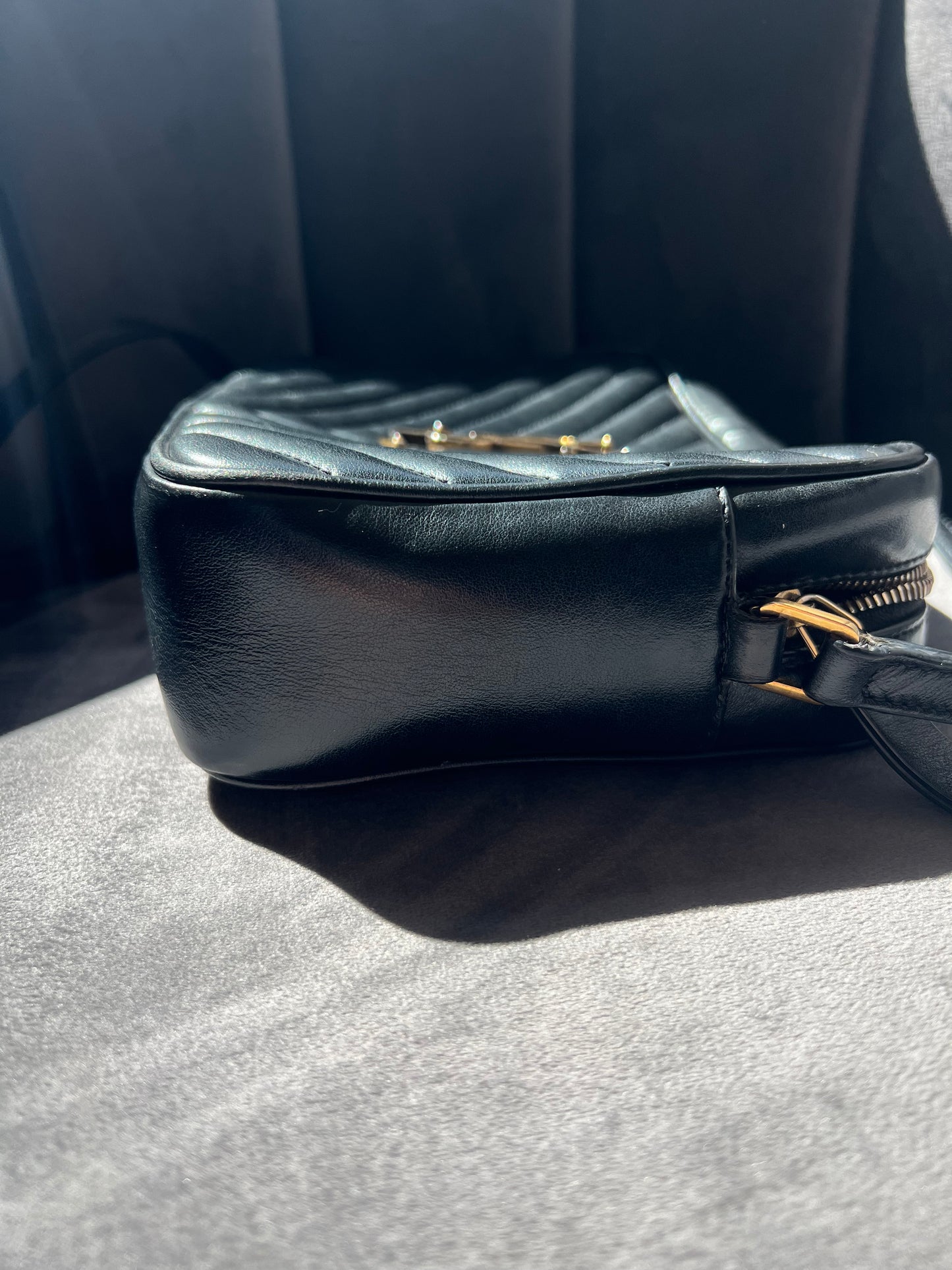 YSL camera bag quilted with gold hardware
