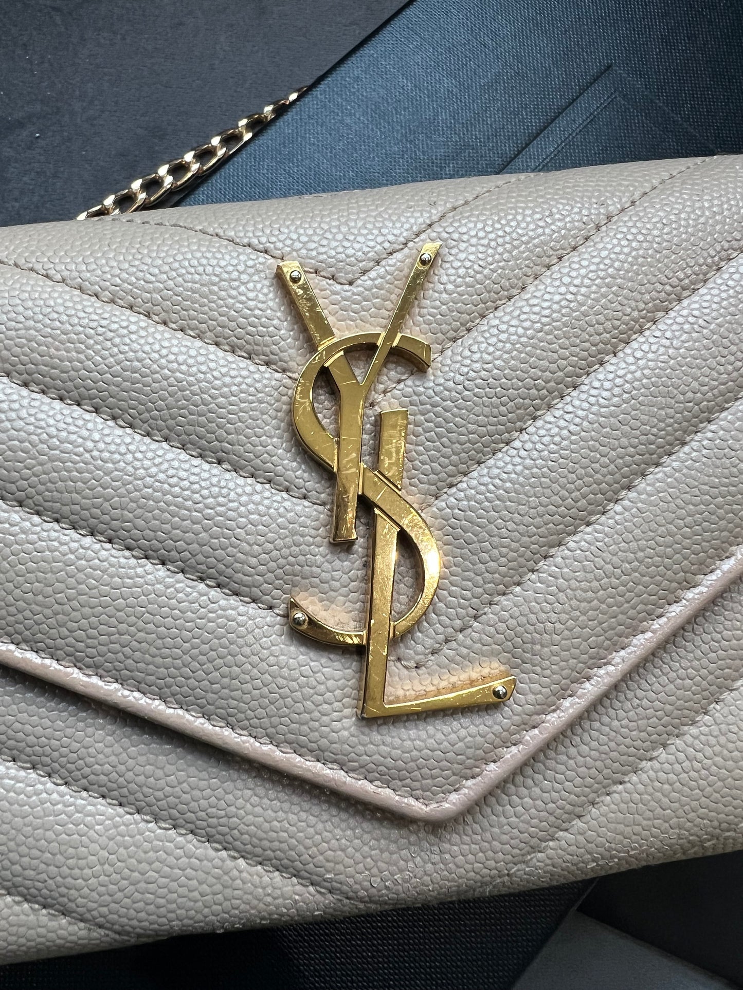 Beige YSL cassandre wallet on chain