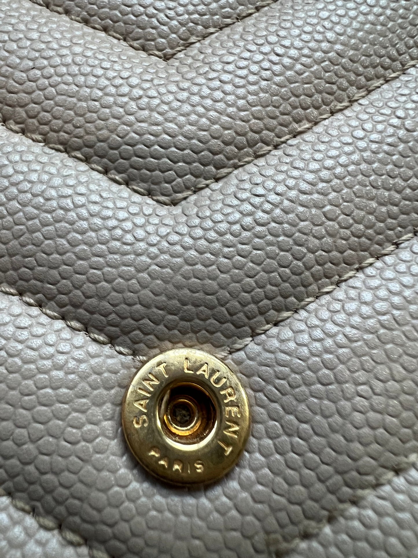 Beige YSL cassandre wallet on chain