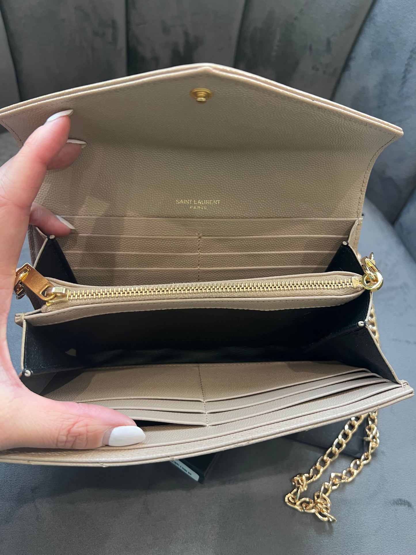 Beige YSL cassandre wallet on chain