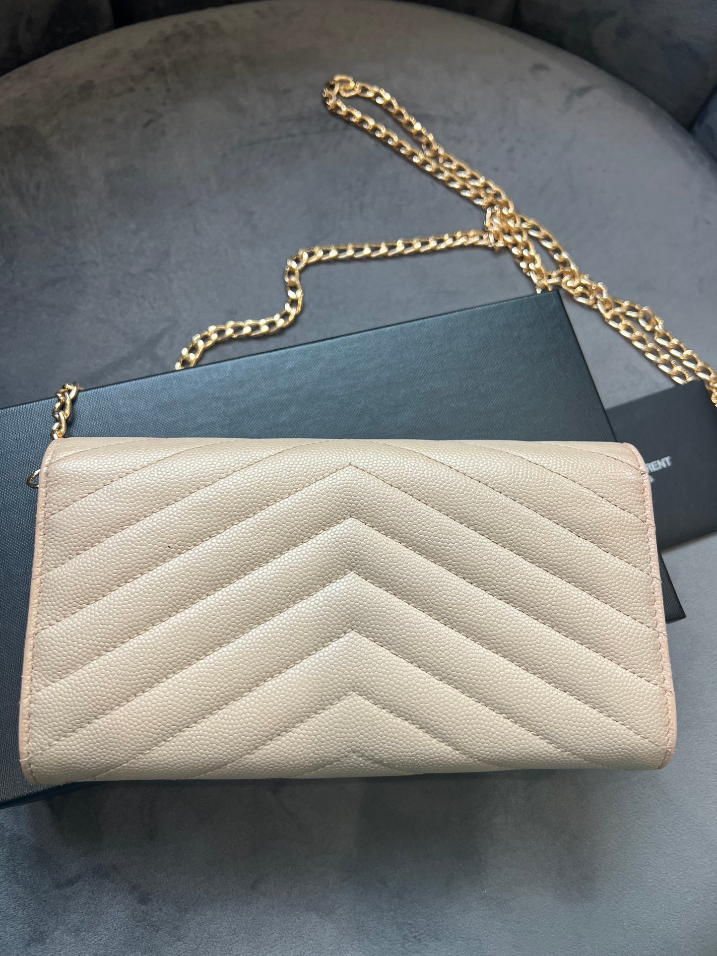 Beige YSL cassandre wallet on chain