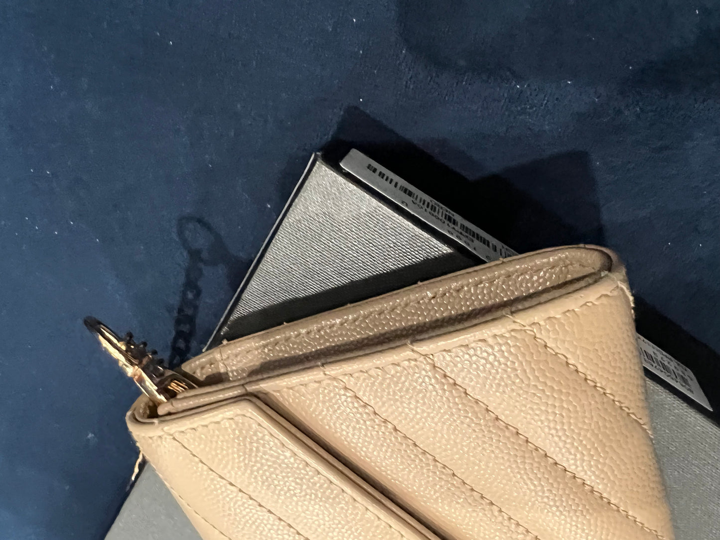 Beige YSL cassandre wallet on chain