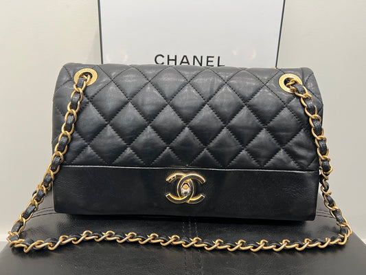 Chanel black single flap quilted handbag