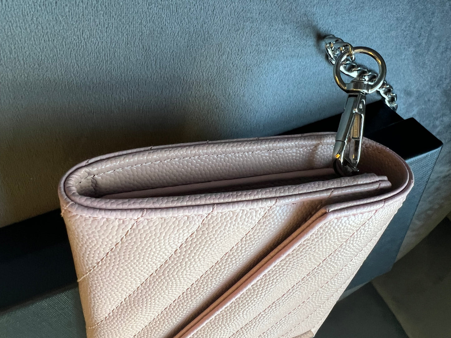 Pink YSL cassandre wallet on chain