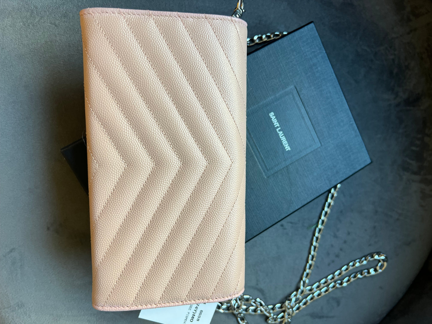 Pink YSL cassandre wallet on chain